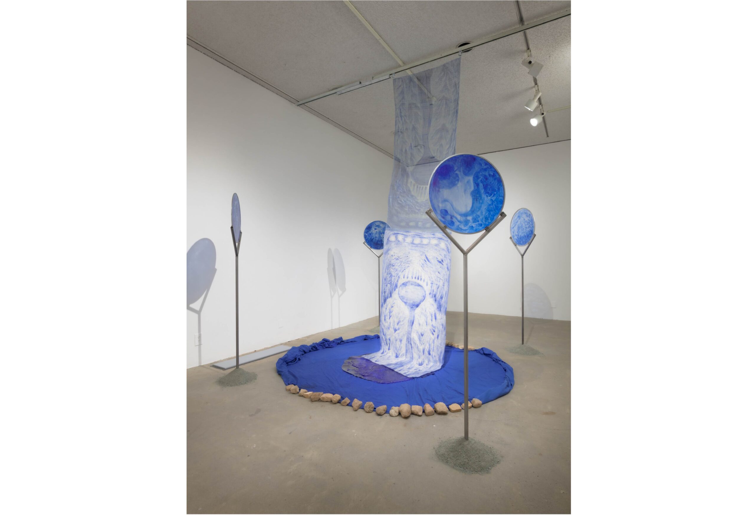 Paige Emery, Divinatory Ecologies for More-Than-Human Time, 2022 - 2026, Oil paint handmade from medicinal plants, fabric and paper made from banana tree fibers, glass, metal, glycerin, soil, rocks, cotton fabric. Courtesy of the Los Angeles Municipal Art Gallery, photo by Robert Wedemeyer